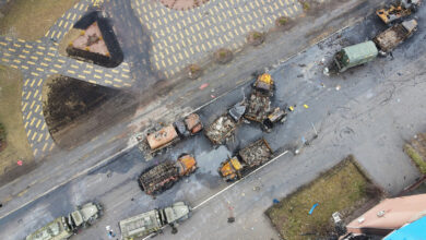 Destroyed Russian military vehicles are seen on a street in the settlement of Borodyanka, Ukraine, on March 3.