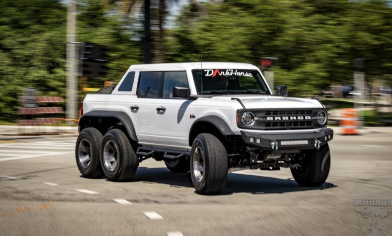 Apocalypse Dark Horse is a Ford Bronco with six wheels and a lifter