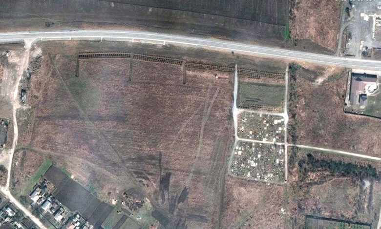 A satellite image shows an alleged mass grave in the village of Manhush, outside the besieged Ukrainian city of Mariupol, on April 3.