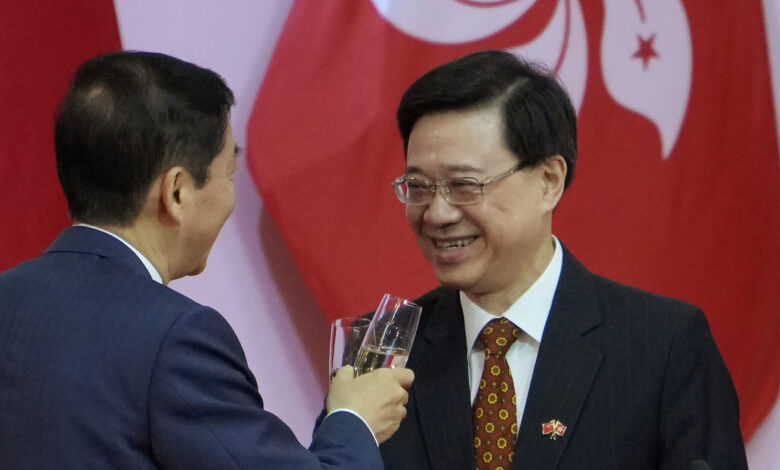 Key figure in repressive law says he will run for top Hong Kong job: NPR