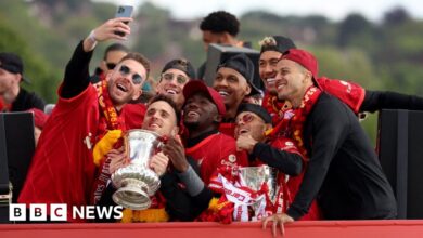 Liverpool turn red for double trophy parade