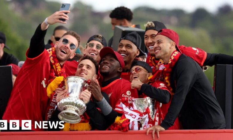 Liverpool turn red for double trophy parade