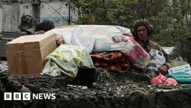 Ukraine War: Refugees from Popasna points loot Russian tanks