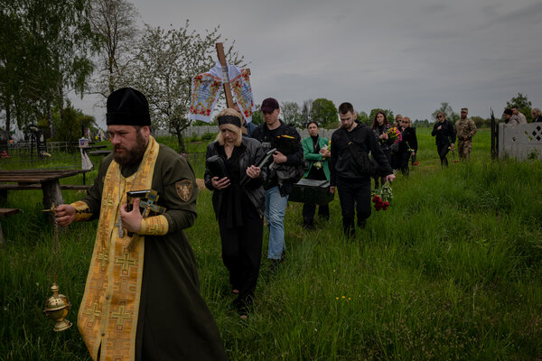 The funeral procession for Denys Ponomarenk, 25, a medic in the Azov battalion, outside the northern Ukrainian city of Chernihiv on Friday.