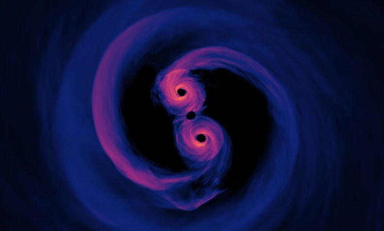 A simulated image of the light emitted by a supermassive black hole binary system.
