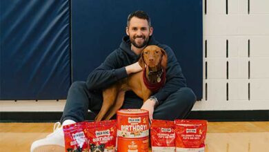 NBA Champion Kevin Love and his dog, Vestry, celebrate the new flavor of Milk-Bone - Dogster treat