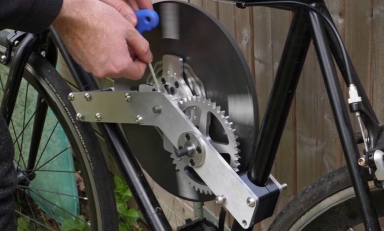 Energy recovery system mounted on a bike. Still image from the YouTube video.