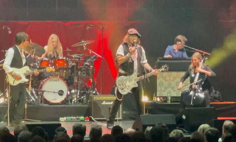 Actor Johnny Depp appears on stage at The Royal Albert Hall alongside Jeff Beck