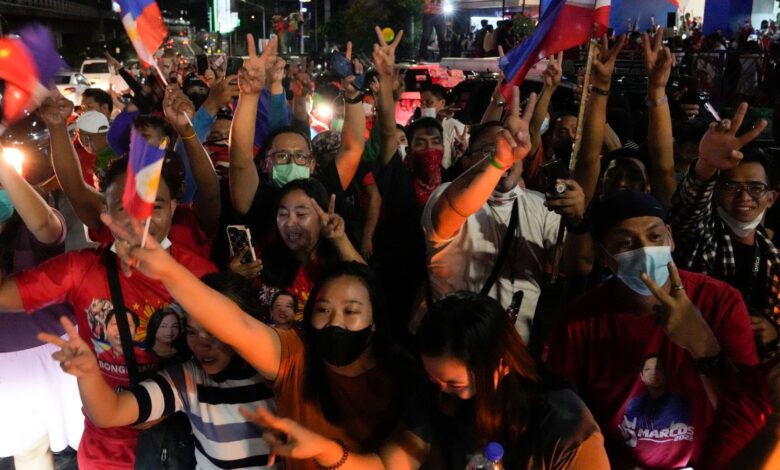 Supporters cheer as they arrive at the headquarters of Ferdinand ...Bongbong... Marcos, Jr. in Mandaluyong, Philippines on Monday, May 9, 2022. The son and namesake of ousted Philippine dictator Ferdinand Marcos took a commanding lead in an unofficial vote count in Monday...s presidential election in the deeply divided Asian democracy. (AP Photo/Aaron Favila)