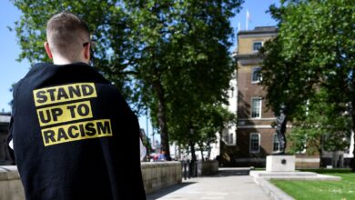 A protester takes part in a demonstration against racism outside Downing Street in London, Britain July 17, 2021. REUTERS/Beresford Hodge