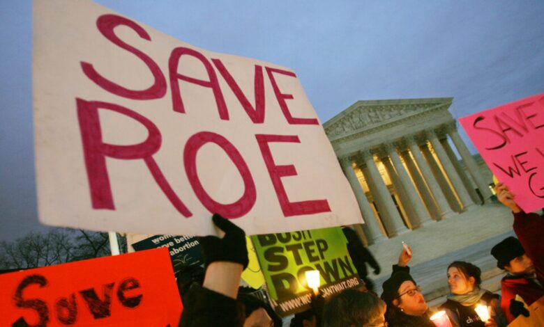 **FILE** Pro-choice supporters hold a candlelight vigil in front of the Supreme Court Building in this Jan. 22, 2005 file photo in Washington. It was 33-years ago today that the Supreme Court decision of Roe versus Wade made abortion legal. For many Americans, the face of abortion is a frightened teenager, nervously choosing to terminate an unexpected pregnancy. The numbers tell a far more complex story. As activists prepare to mark the 35th anniversary of the Supreme Court's Roe v. Wade decisio