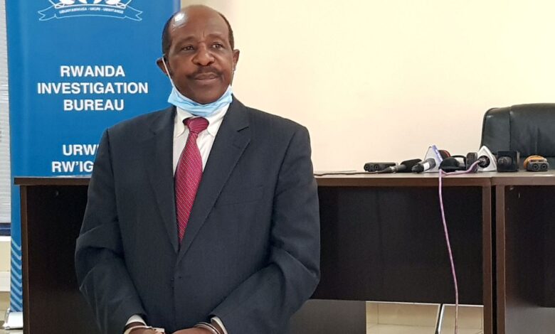 Paul Rusesabagina was paraded in handcuffs before the media at police headquarters