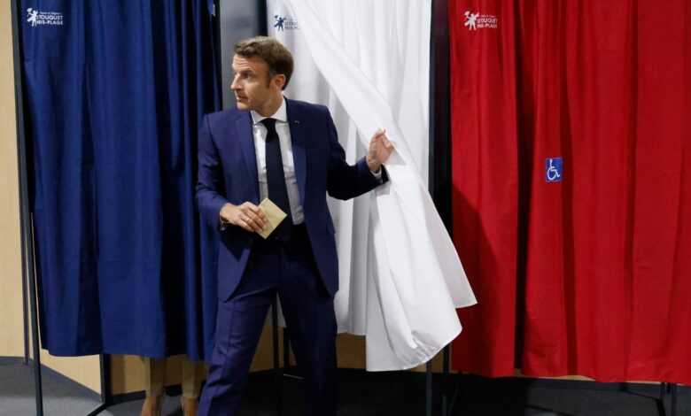 Macron faces uphill battle for control of parliament as France votes
