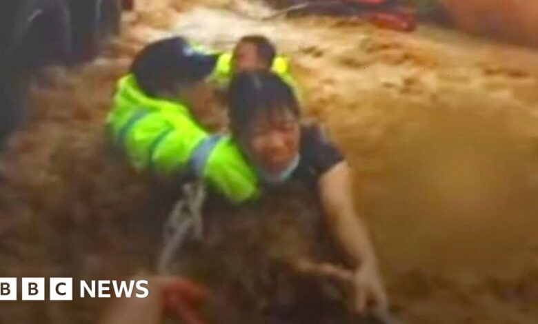The moment a woman was saved from raging flood waters in China