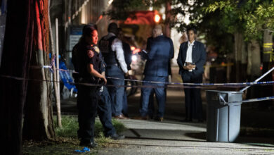 Woman shot to death while pushing baby in stroller on east side