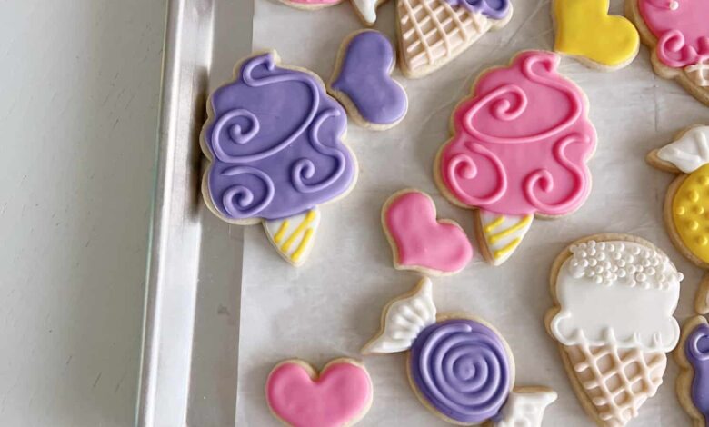 summer themed sugar cookies on a sheet pan