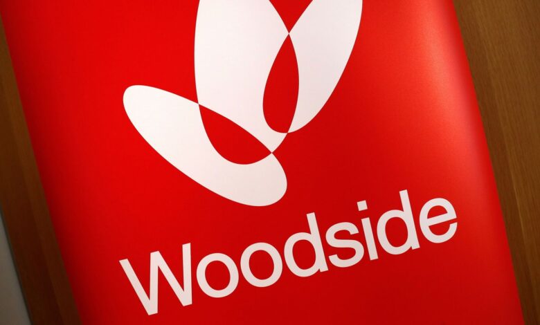 The logo for Woodside Petroleum, Australia's top independent oil and gas company, adorns a promotional poster on display at a briefing for investors in Sydney, Australia, May 23, 2018