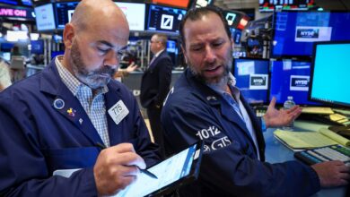 Stock futures rise slightly as Wall Street awaits more bank earnings
