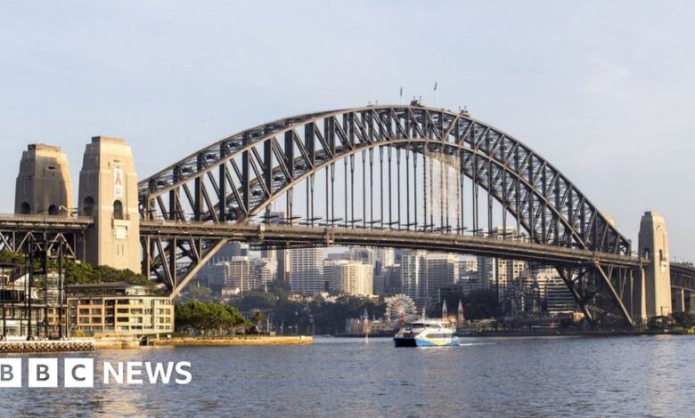 Aboriginal flags fly forever over Sydney Harbor Bridge