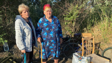 Ukrainian villagers flee Russian-occupied Kherson on foot, on bicycles and in wheelchairs: NPR