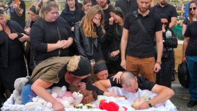 Family members Mourning a 4-year-old girl killed in a Russian missile attack