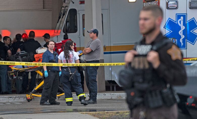Emergency personnel gather after a deadly shooting Sunday, July 17, 2022, at the Greenwood Park Mall, in Greenwood, Ind. (Kelly Wilkinson/The Indianapolis Star via AP)