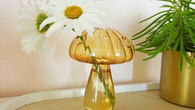 glass mushroom vases with fresh flowers