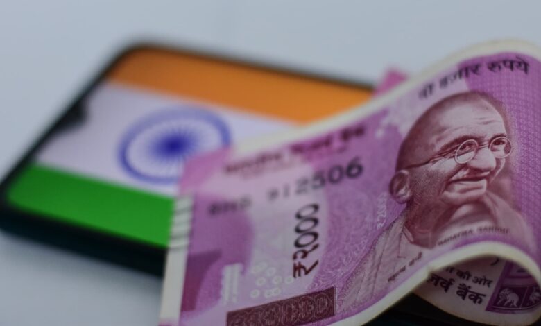 Indian rupee weakens, hits new low amid global turbulence