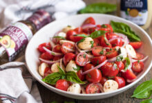 cherry tomato salad with balsamic in white bowl