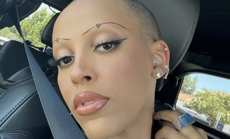 Doja Cat assures supporters she's fine after a recent hair and eyebrow shave