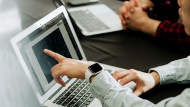 IT pro working in front of a laptop