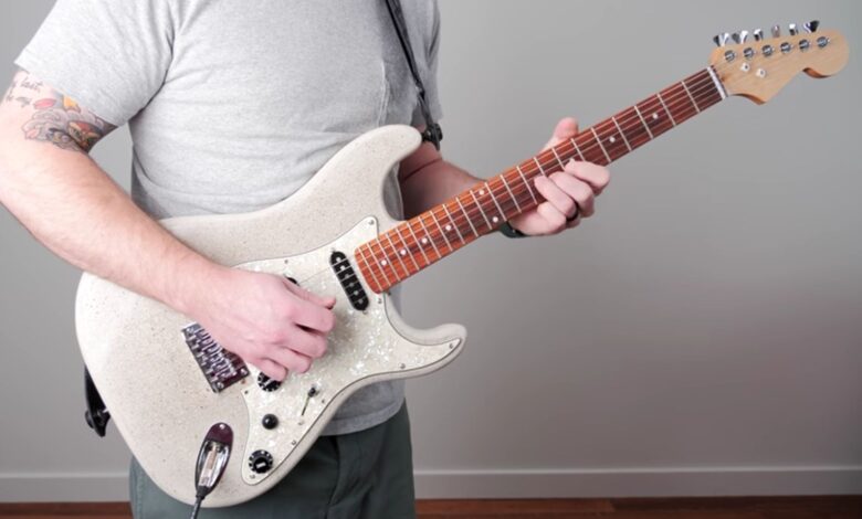 A guitar made from concrete. Image credit:  Crafted Workshop (still image from the YouTube video)