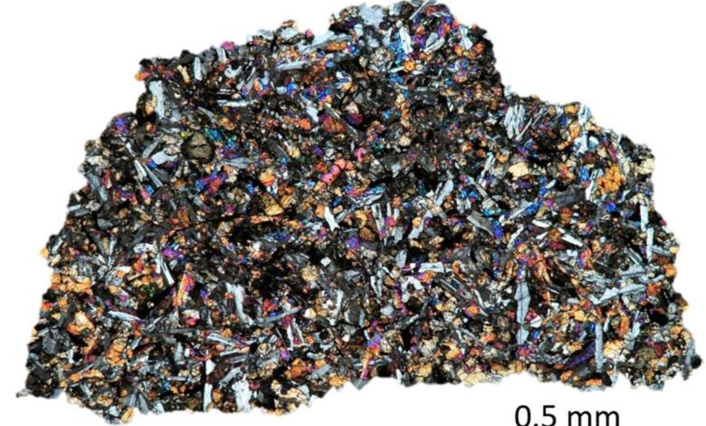 Thin section of NASA sample, LAP 02436, Lunar Mare Basalt containing indigenous noble gases. Image type: optical microscopy, cross-​polarized light. (Image credit: ETH Zurich / Patrizia Will)