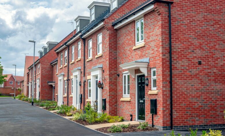 A row of newly built houses, built to a traditional brick design in the North of England.