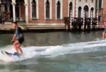 Surfers in Venice. Pic: Luigi Brugnaro