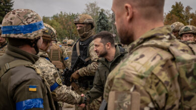Zelensky visits a city just a few miles from the front, asserting Ukraine's interests