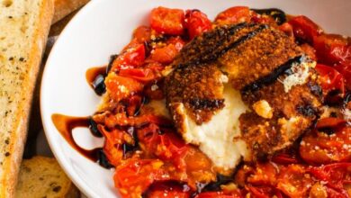 Fried burrata served with cherry tomato sauce, balsamic glaze, and toasted ciabatta