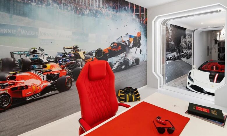 The Ferrari room of the Dallas mansion is a life-size car display cabinet