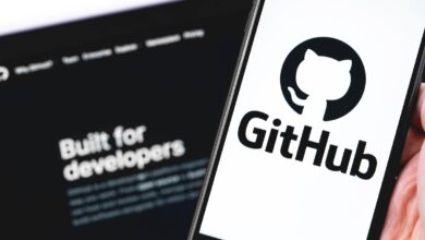 GitHub logo on the screen smartphone and notebook closeup. GitHub is the largest web service for hosting and developing IT projects. Moscow, Russia - July 12, 2020