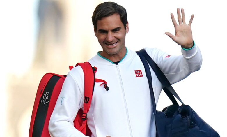 File photo dated 07-07-2021 of Roger Federer waves to the spectators as he walks over the bridge on day nine of Wimbledon at The All England Lawn Tennis and Croquet Club, Wimbledon. Roger Federer has announced he will retire from professional tennis after the Laver Cup. Issue date: Thursday September 15, 2022.