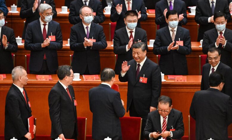 China shuffles leadership committee and retains many of Xi's allies