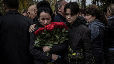 On the outskirts of Kyiv symbolizing war, a family pays the price to say goodbye to a fallen soldier