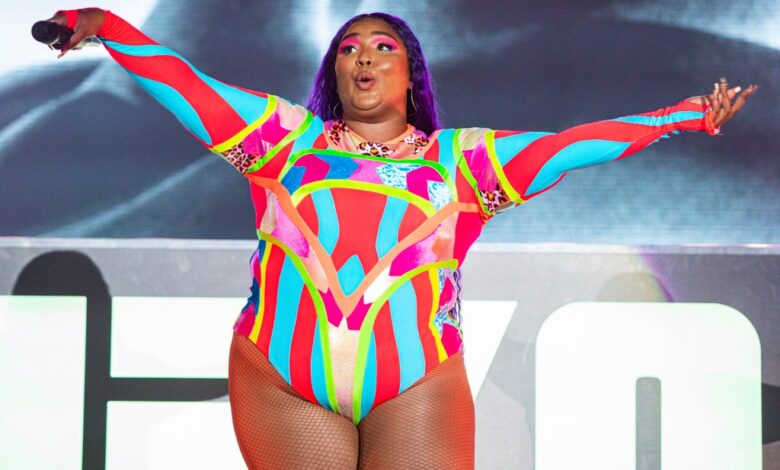 Lizzo claps back as fans ask what if someone wears a "fat suit" after she dresses up as Chrisean Rock