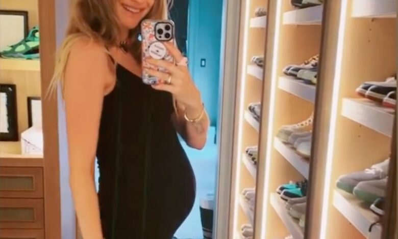 Behati Prinsloo shows off her pregnant belly after Adam Levine's scandal DM