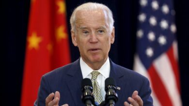 Biden says won't conflict with China, as first summit ends in Asia