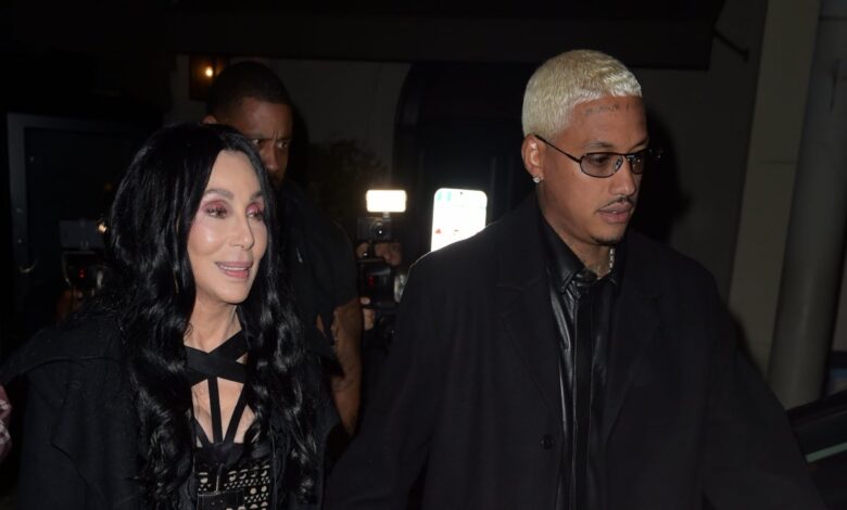 Cher holds hands with Alexander 'AE' Edwards after a night out