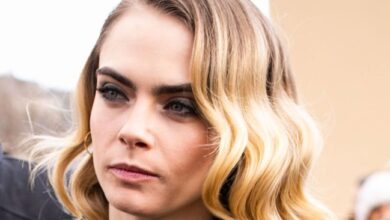 Cara Delevingne arrived at the airport in the sexiest coat