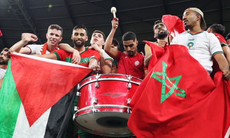 Waving the Palestinian flag, welcoming the unofficial team of the World Cup