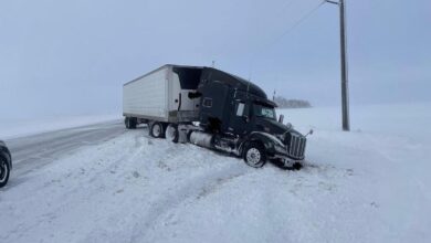 Winter storm Diaz buries large rig in snow in South Dakota