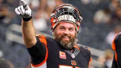 Bengals coach Zac Taylor chuckles during Andrew Whitworth's reunion talk